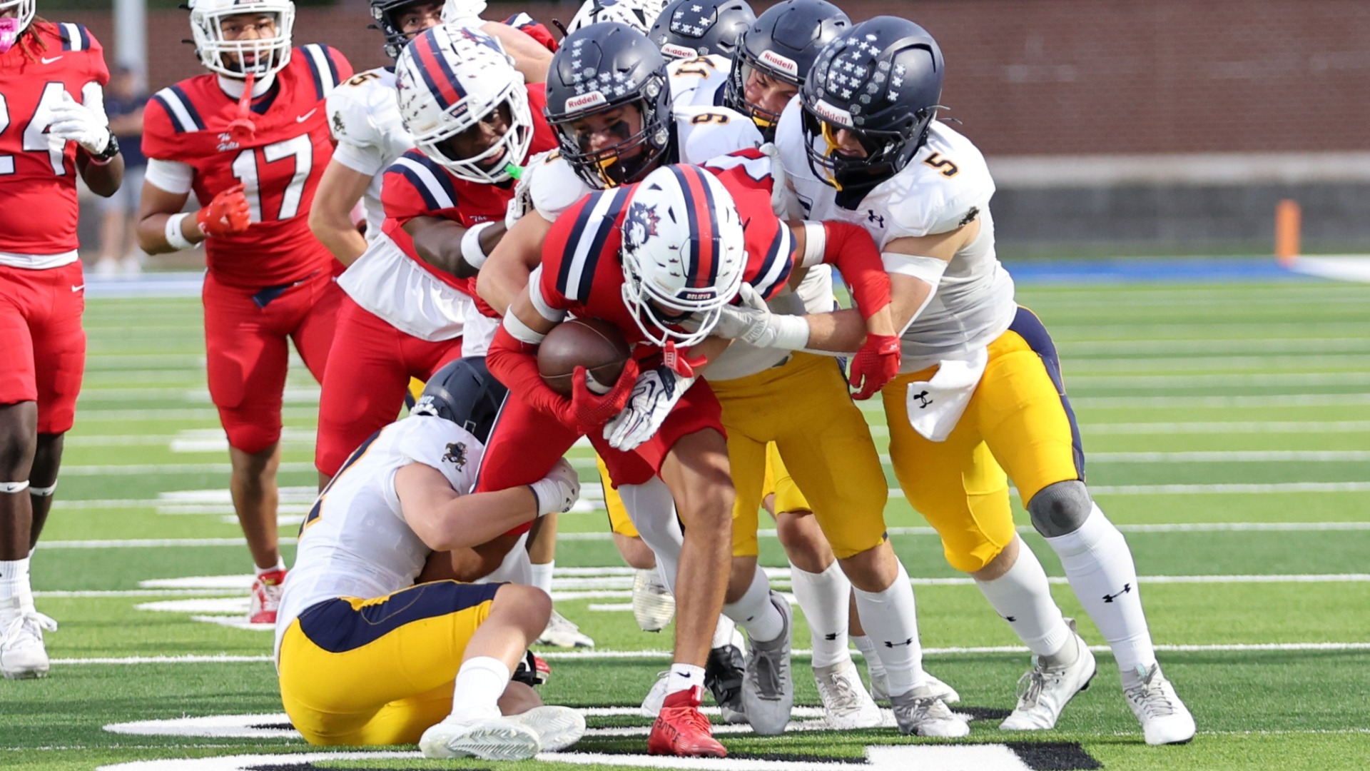 Slide 0 - Scots Varsity Football Team Defeats Richland 
