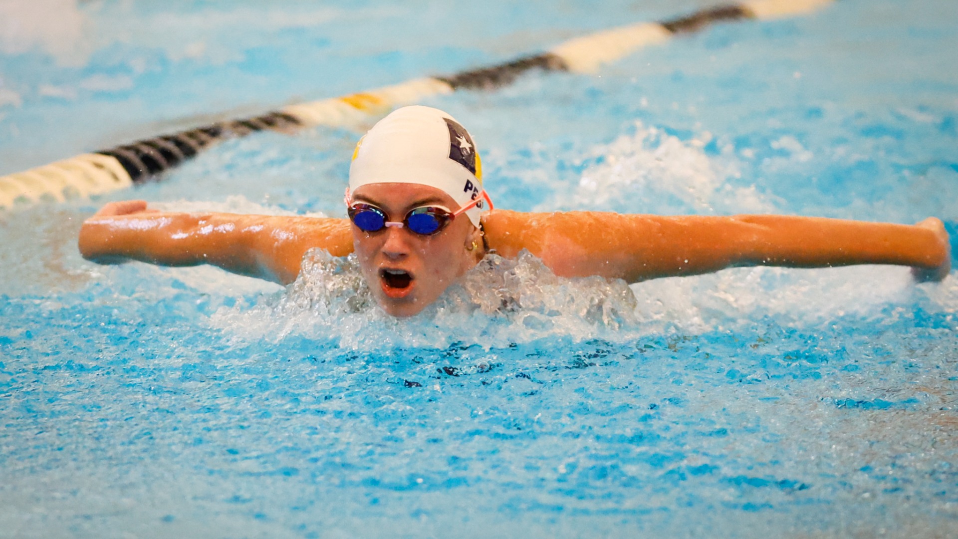 Slide 2 - Lady Scots Blue Wave Competes Well at Tri-Meet