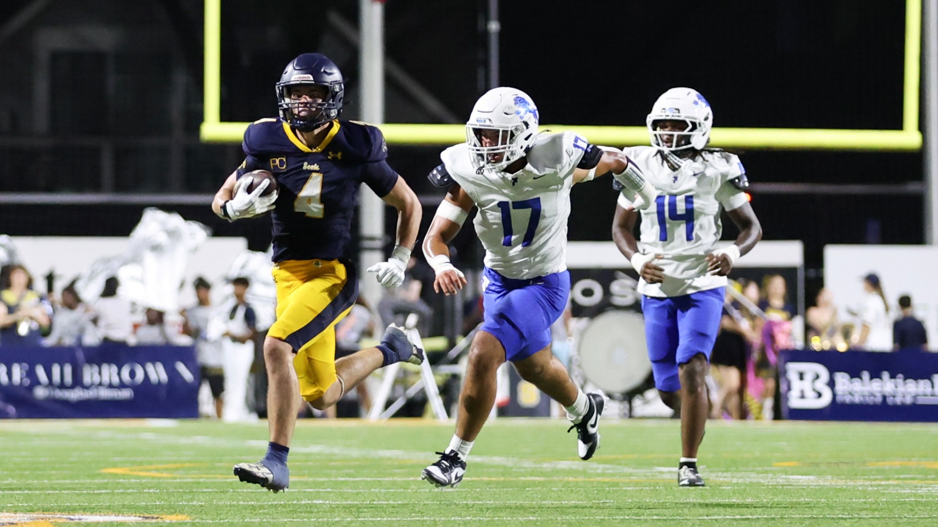 Slide 1 - Scots Football Team Wins Home Opener vs Tyler