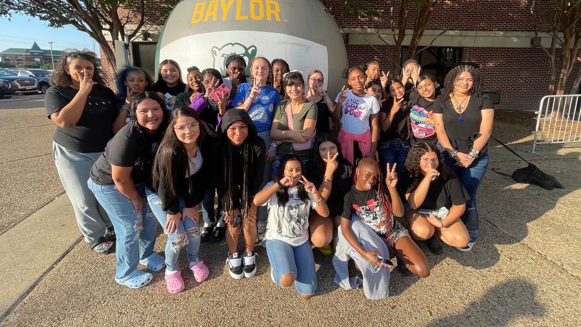 Slide 7 - Lady Bearcats attend Baylor/ Wisconsin match