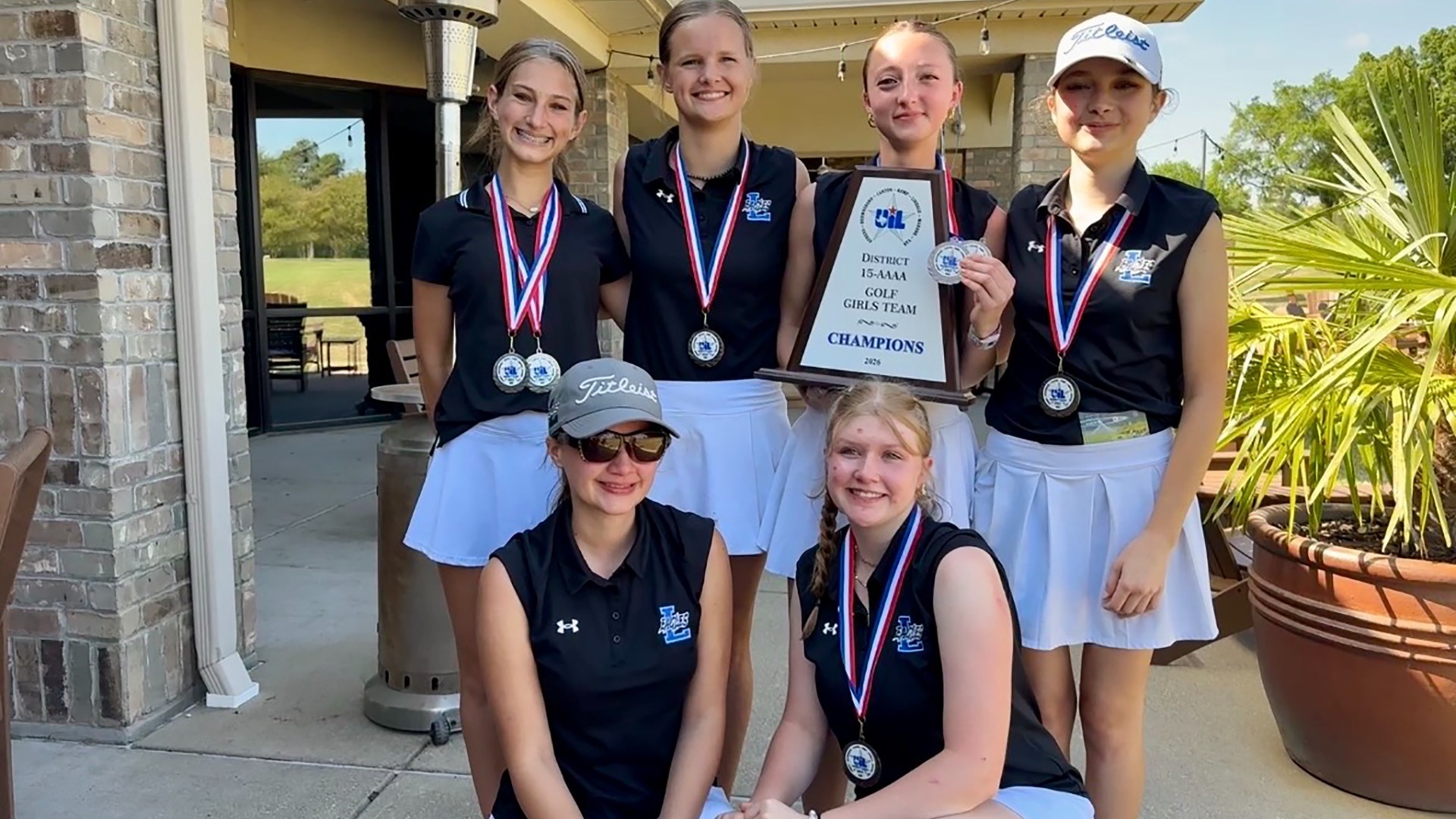 Girls win district in golf.