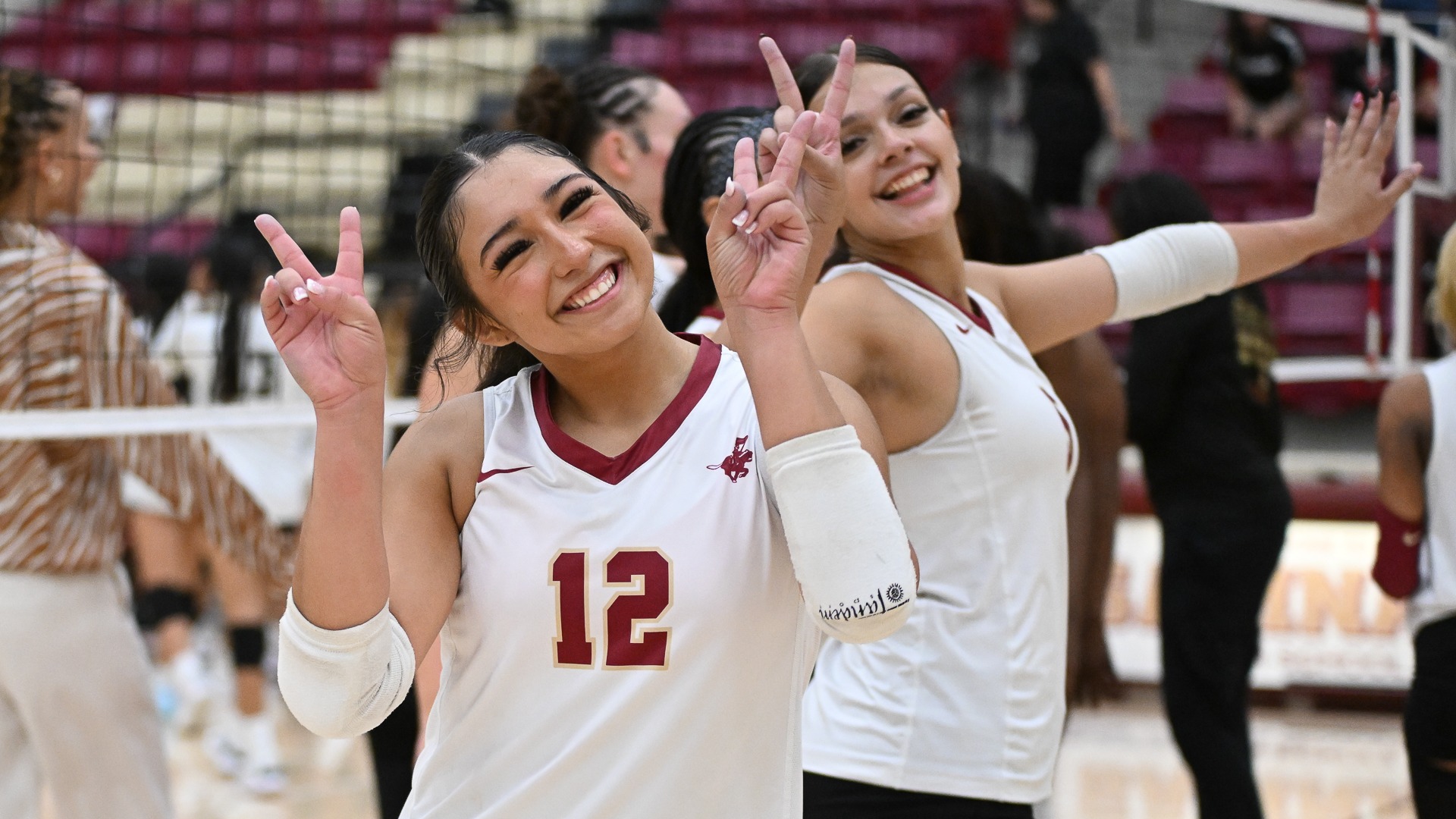 Slide 0 - Lady Rough Riders sweep Irving in season's first home game