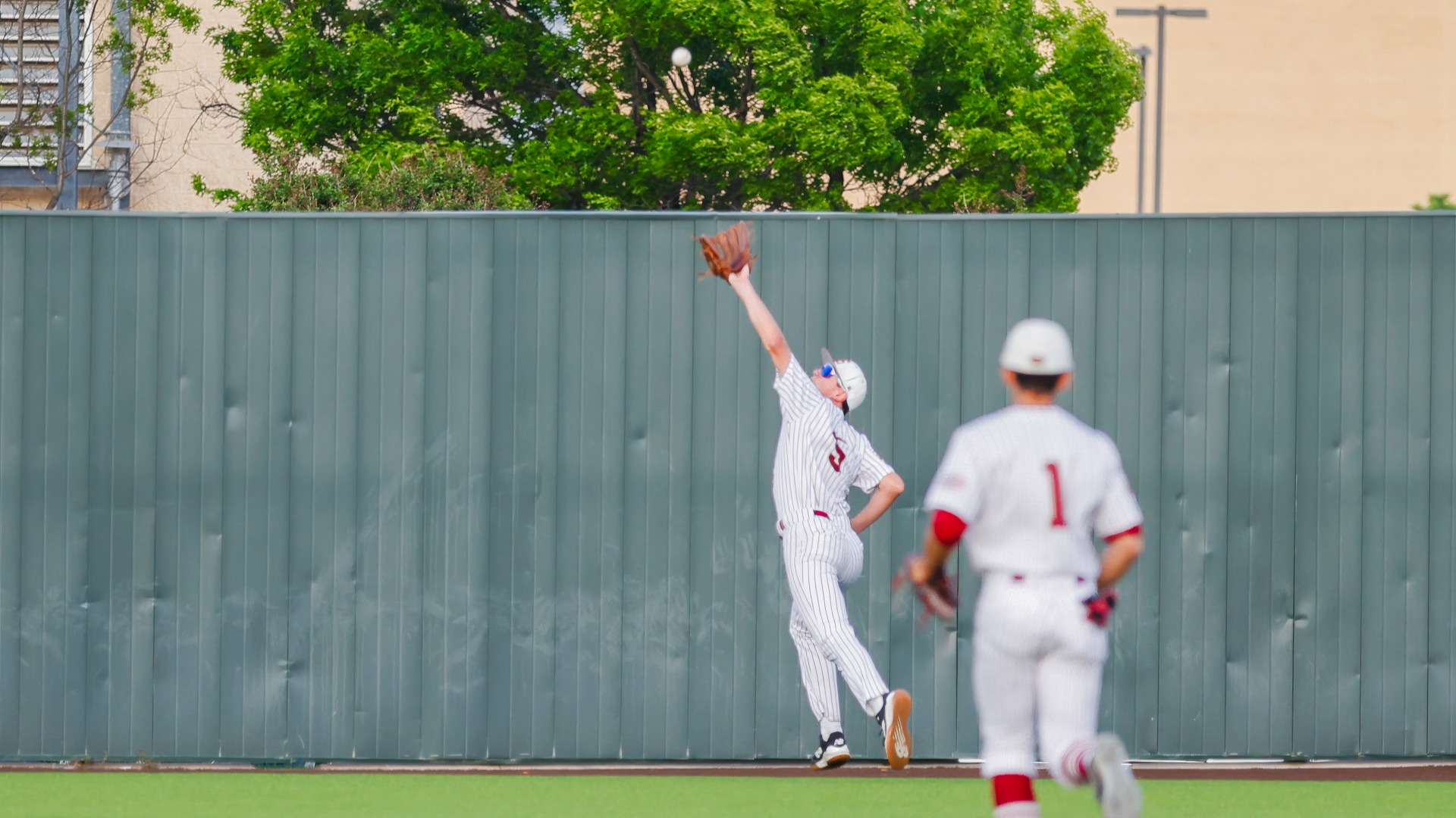 Slide 0 - ROUGH RIDERS NARROWLY DEFEAT BREWER