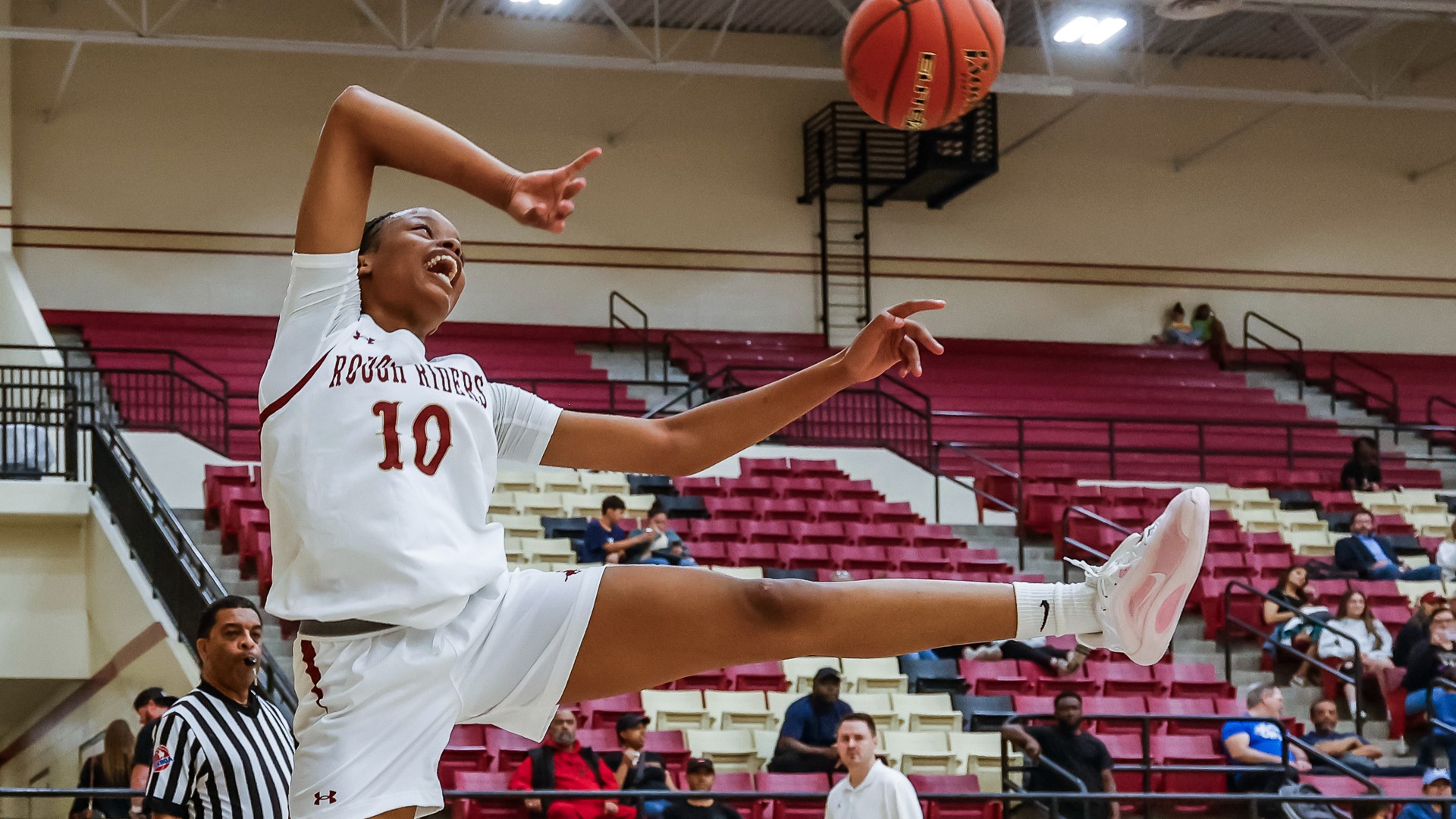 Slide 0 - LADY ROUGH RIDERS HANDILY DEFEAT FRISCO