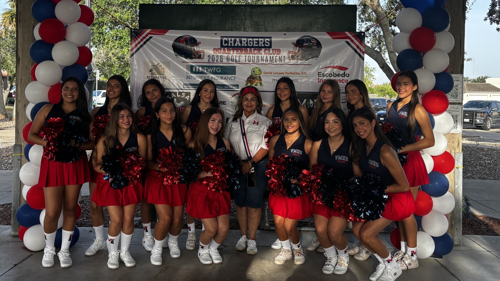 Slide 2 - Our fearless leader, Ms. Canales, and our amazing cheerleaders brought plenty of Charger spirit to the Quarterback Club’s 2nd Annual Golf Tournament! 