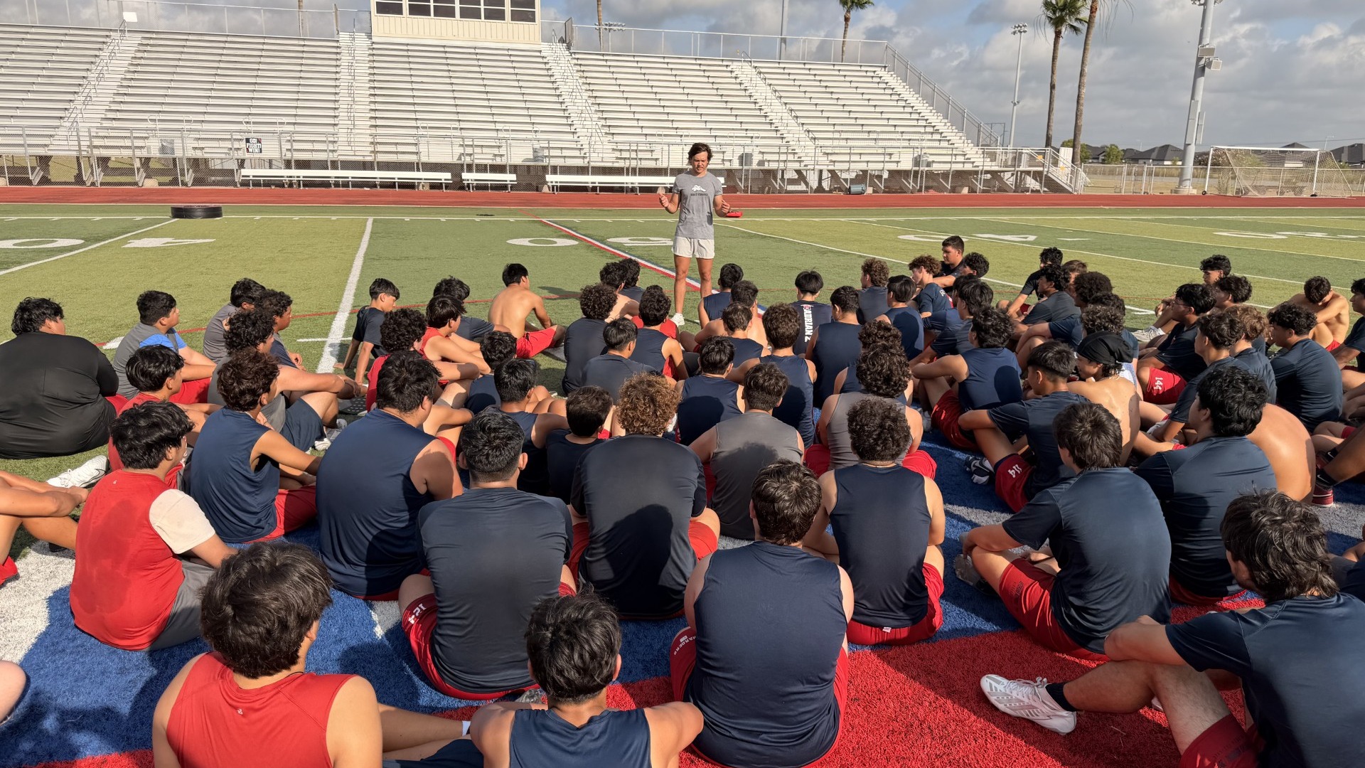 Slide 3 - Charger alumnus and current ENMU wide receiver Gerry Gomez visited the football team, offering advice, motivation, and pointers as the Chargers gear up for the season ahead.