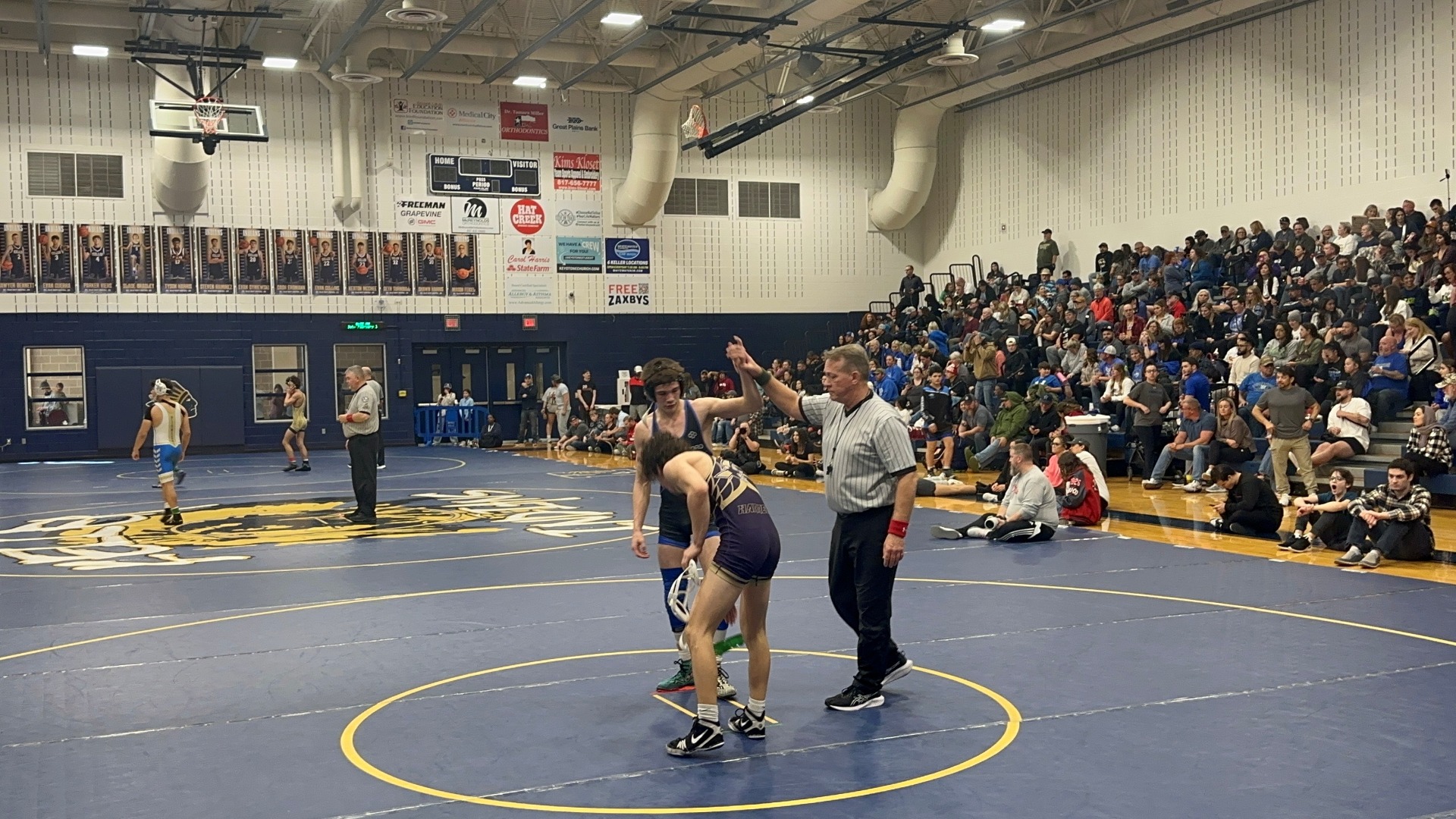 Slide 4 - Regional Wrestling, Spotanski Advances to State