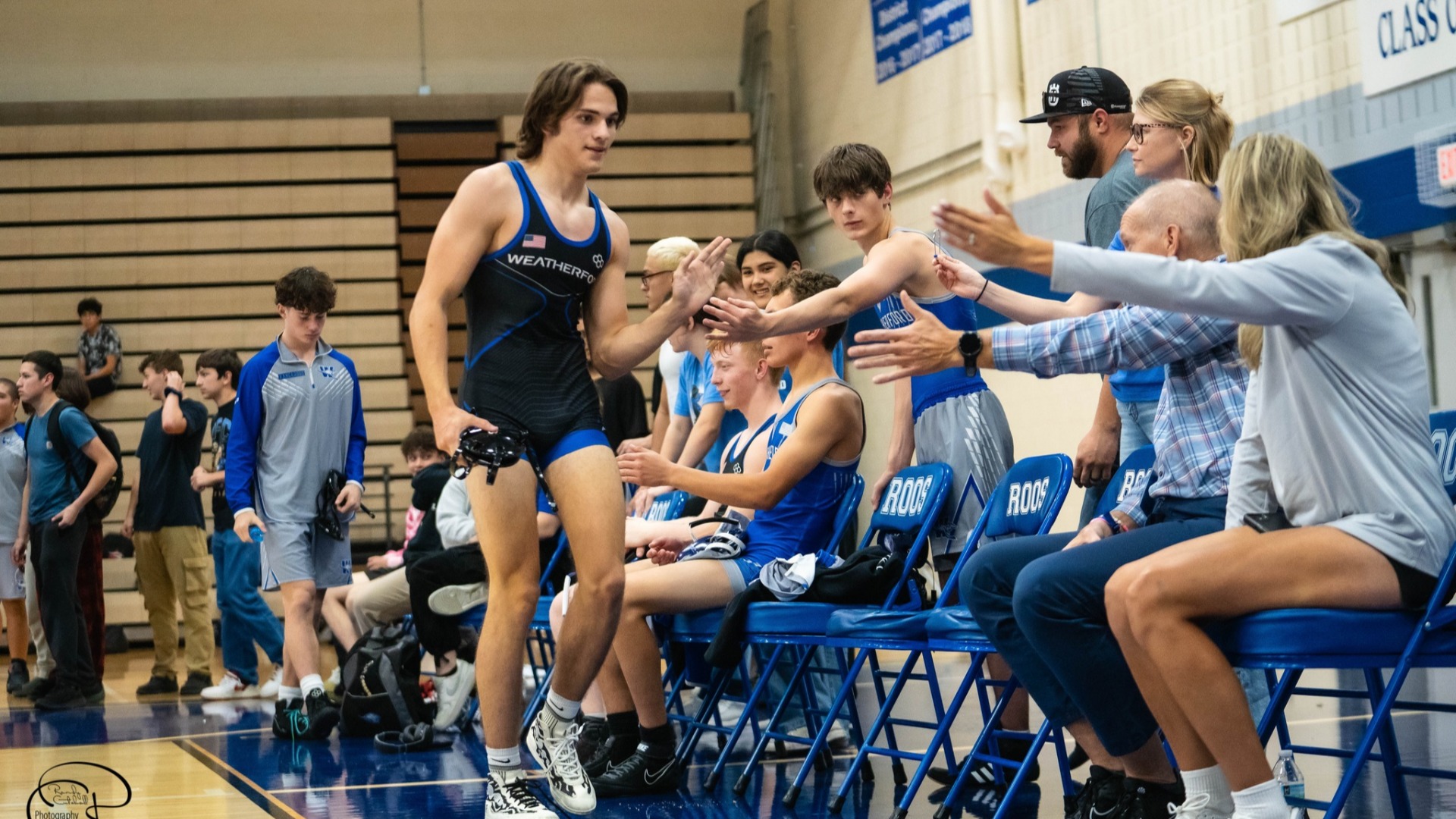 Slide 4 - Wrestling Defeats Chisholm Trail