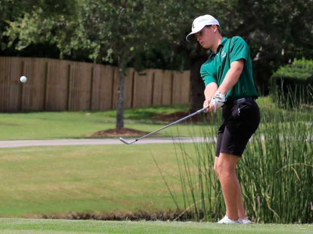 Father Lopez's Jack Rossheim chips onto the green during the Volusia/Flagler Boys Championship on Monday, Oct. 9, 2023 at Crane Lakes in Port Orange.