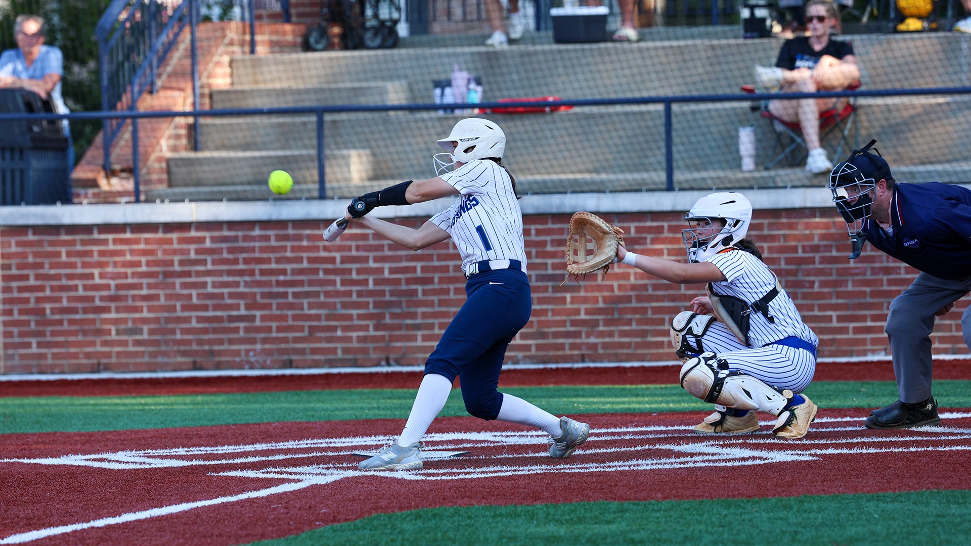 Slide 0 - VARSITY SOFTBALL SECURES 4-2 REGION WIN OVER ST. FRANCIS