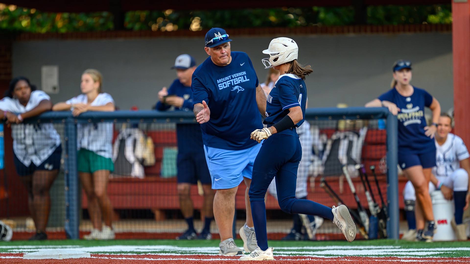 Slide 0 - VARSITY SOFTBALL PUSHES WINNING STREAK TO THREE WITH 8-0 VICTORY OVER WESLEYAN