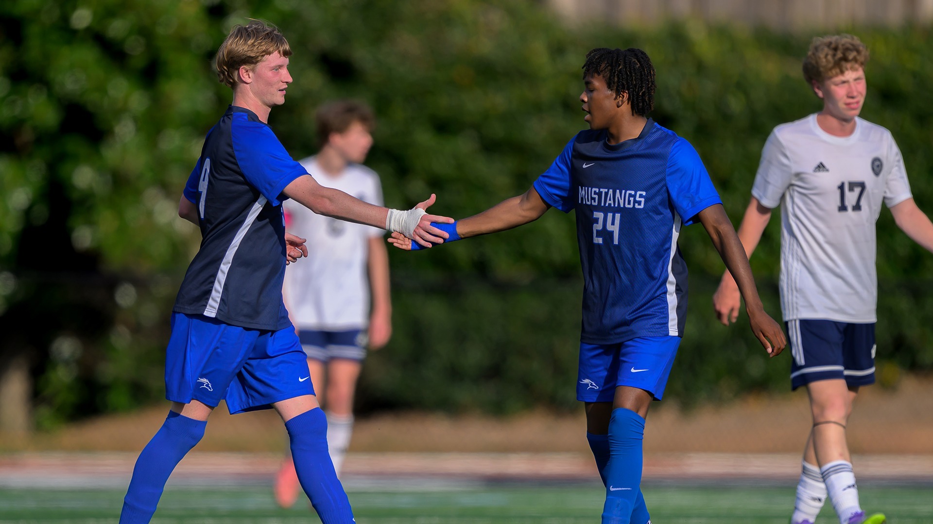Slide 0 - VARSITY BOYS SOCCER PUSHES PAST WESLEYAN 2-1