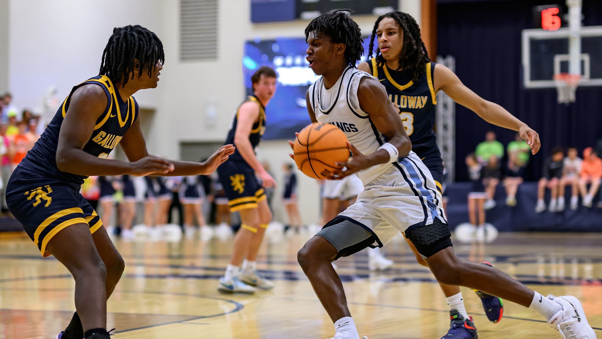 Slide 0 - VARSITY BOYS BASKETBALL GARNERS WIN OVER TOP-RANKED BERKMAR, 59-56