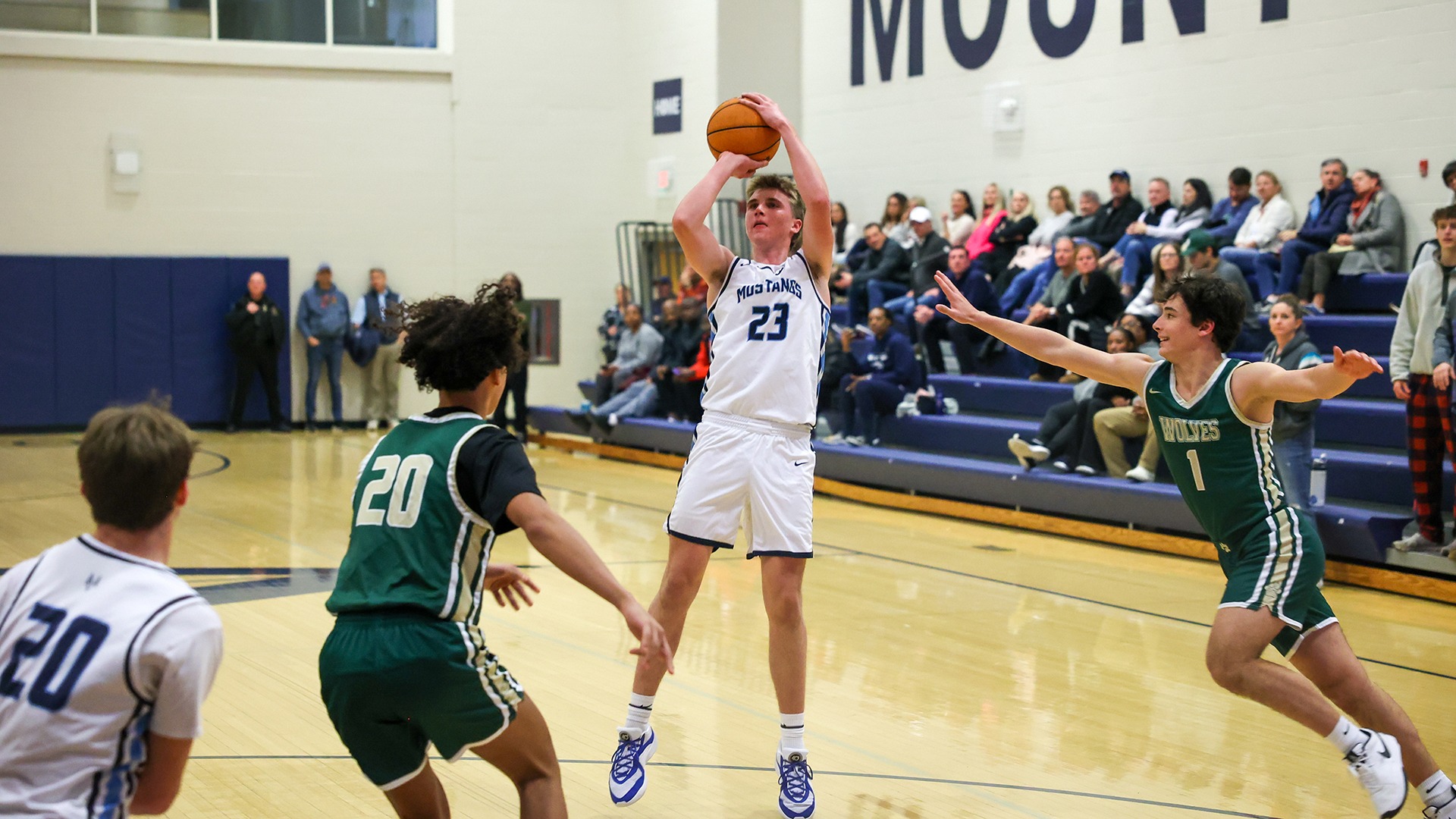 Slide 0 - MUSTANGS RING IN NEW YEAR WITH 59-37 REGION VICTORY OVER WESLEYAN