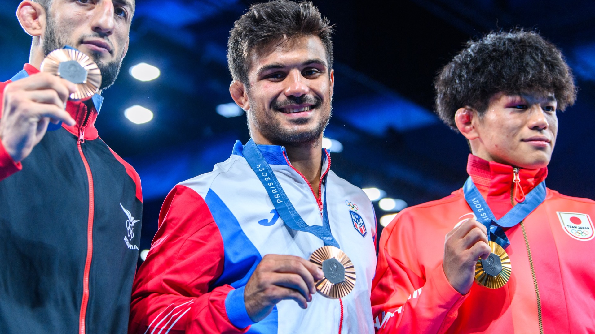 Slide 3 - RIVERA ’16 TAKES HOME WRESTLING BRONZE MEDAL AT PARIS OLYMPICS