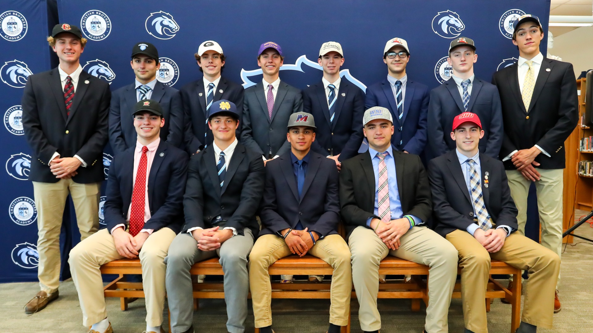 CBASlide 0 - THIRTEEN STUDENT-ATHLETES COMMIT TO PLAY COLLEGE ATHLETICS