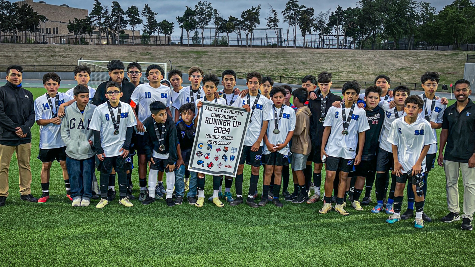 Slide 0 - Spartans' Soccer Receive ACAC Runner-Up Banner