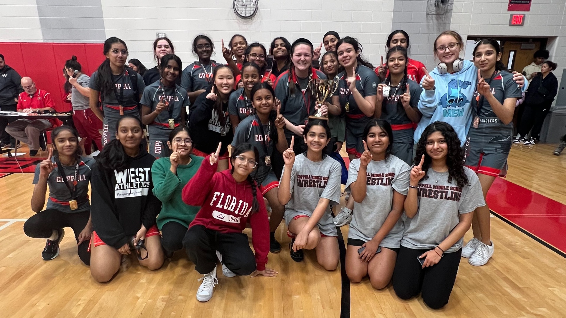 Slide 0 - Lady Wranglers Wrestling Wins Back to Back All-Cities Championships!