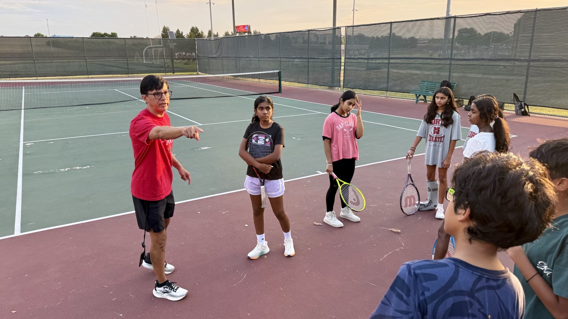 Slide 1 - Early Morning Tennis Practice
