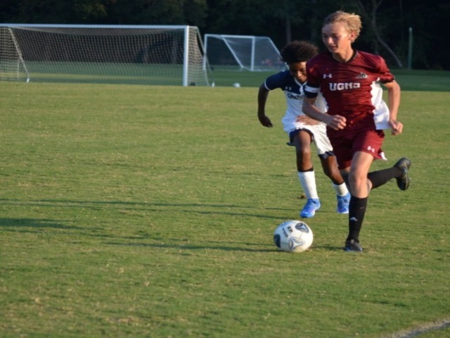 Jackson Behmer pushes the ball against Westminster Catawba