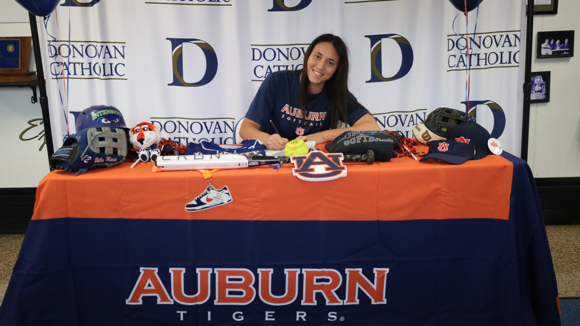 Slide 3 - National Signing Day — Isabella Maria commits to Auburn University to continue her academic and softball career 