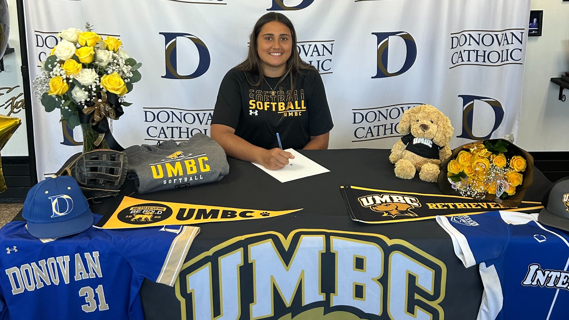 Slide 0 - Jaelynn Nunez signs her NLI to play DI Softball at UMBC