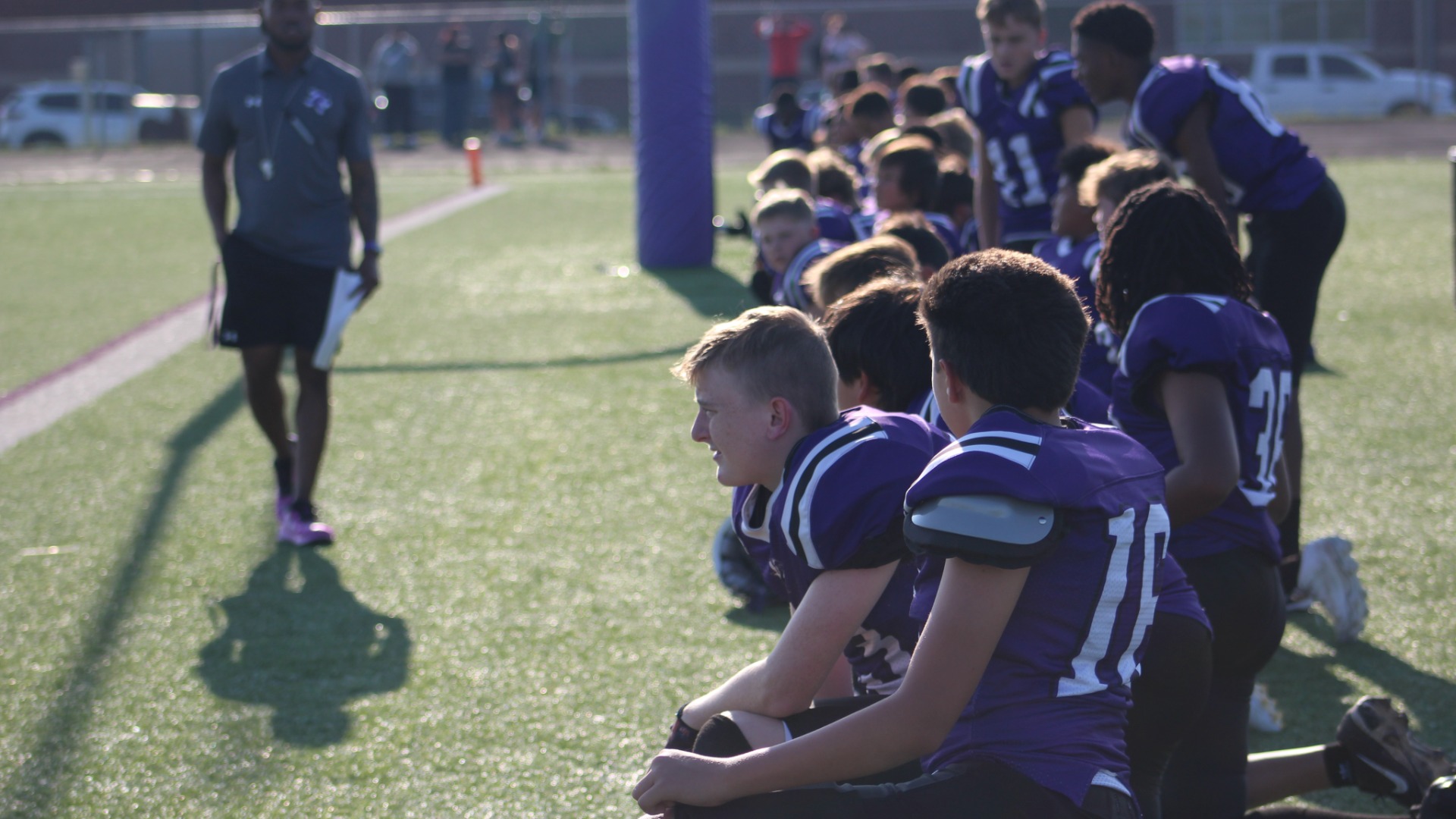 football players looking towards the field
