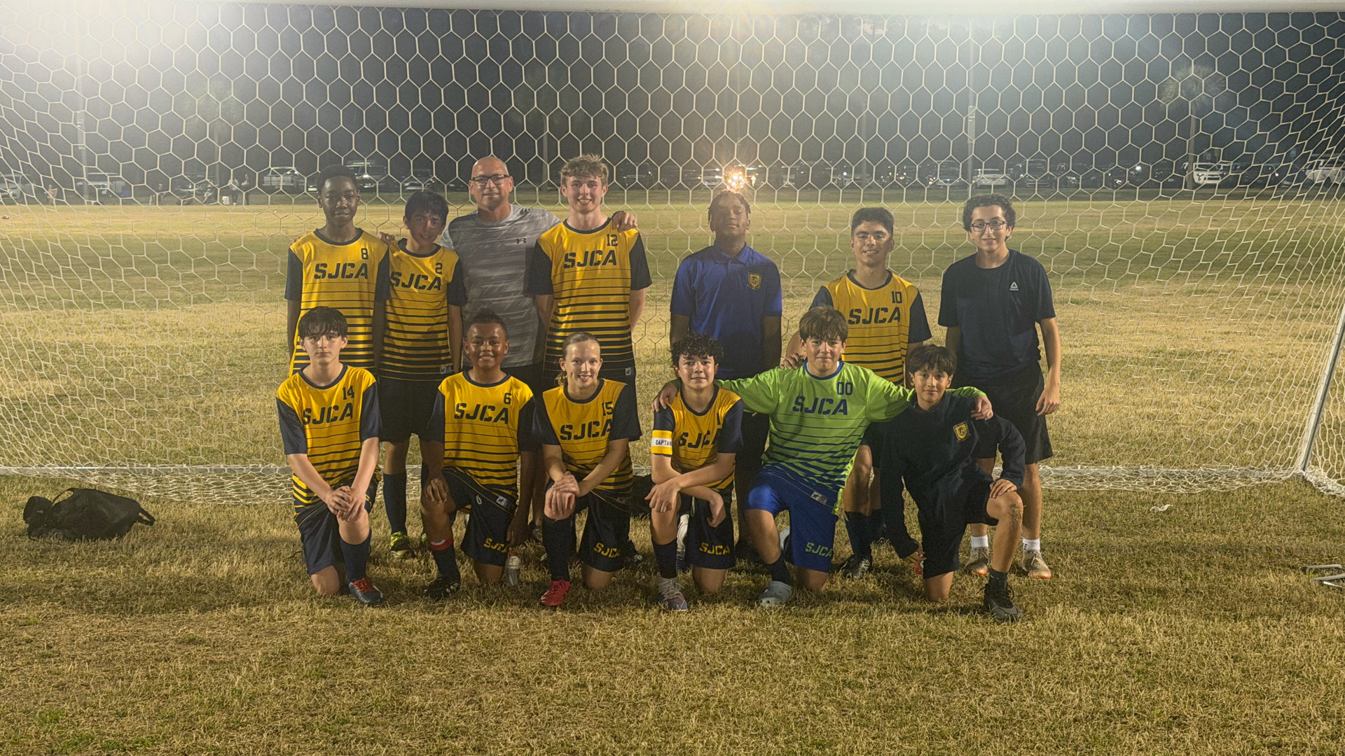 Slide 2 - 7/8 aoccer team bringing home the win! 