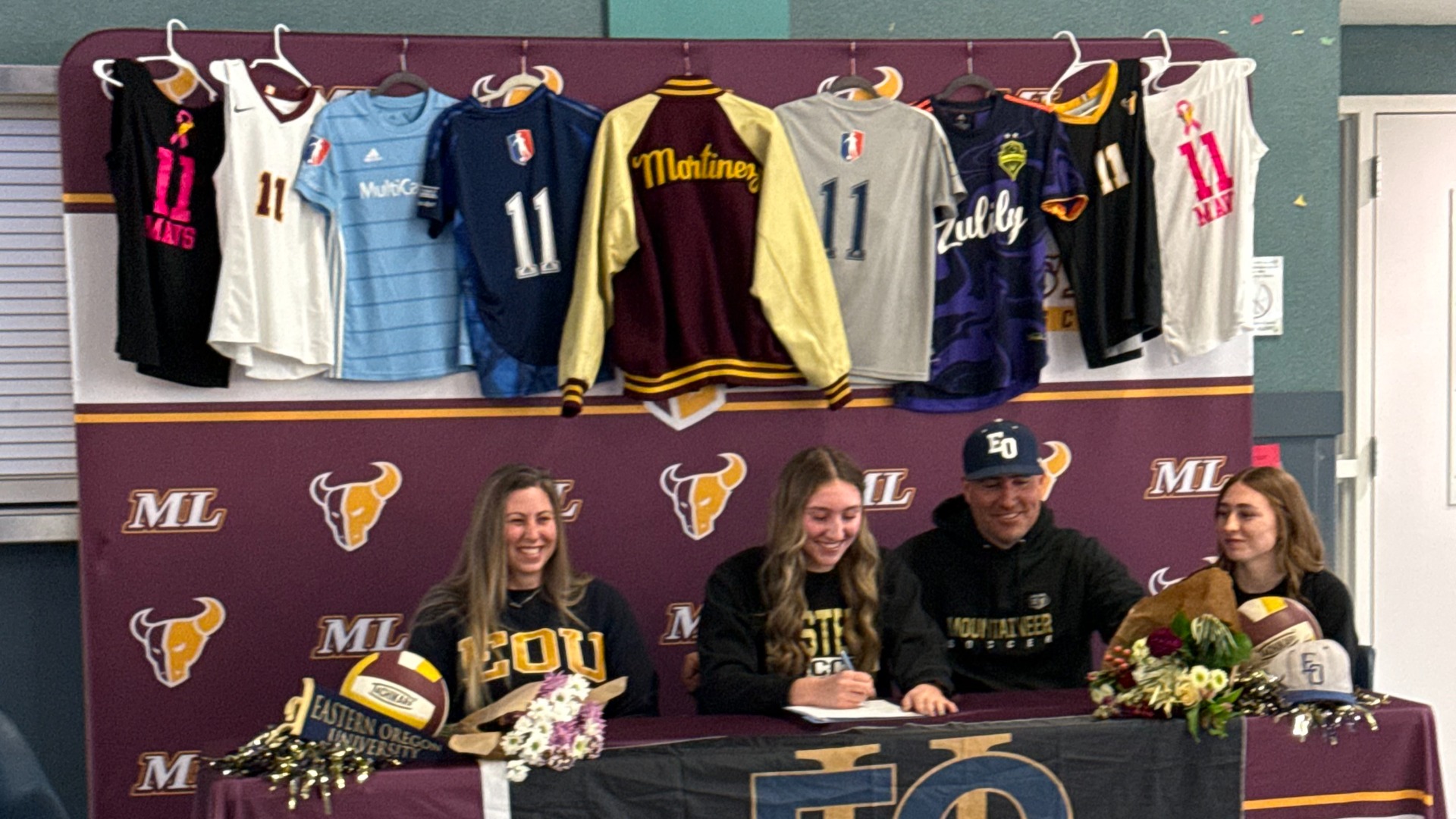 Slide 1 - Martinez signs with Eastern Oregon University 