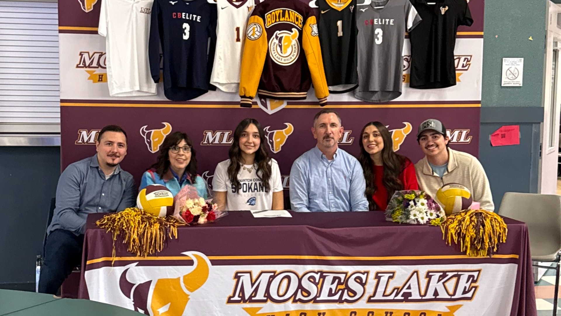 Slide 0 - Roylance signs with Spokane Community College