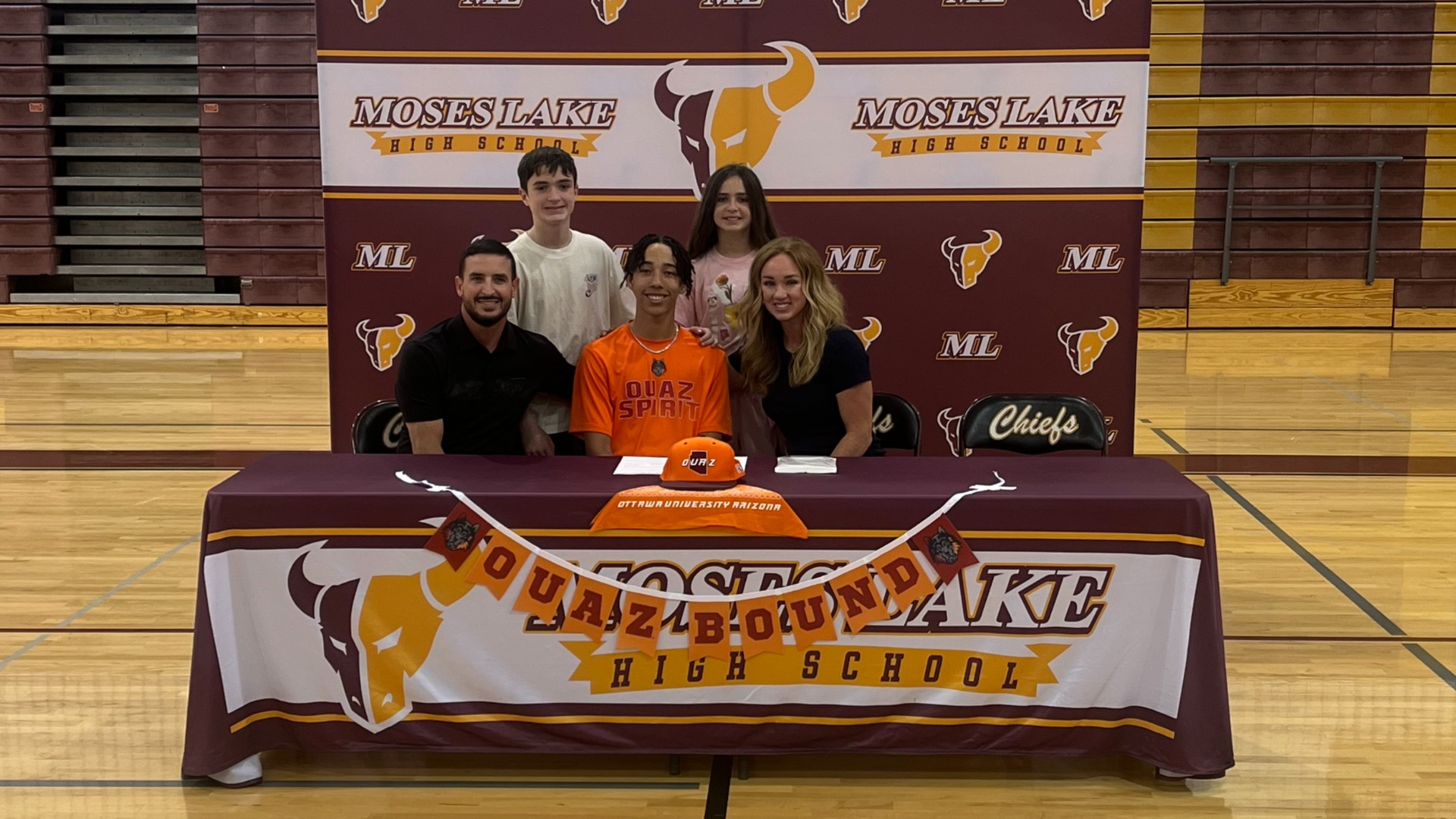 Slide 2 - Miller signs with Ottawa University