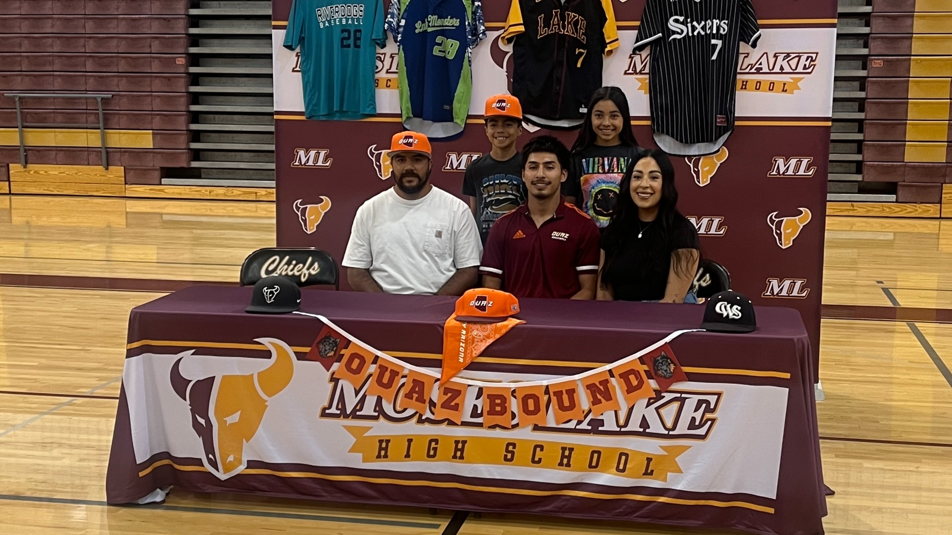 Slide 4 - Hernandez signs with Ottawa University