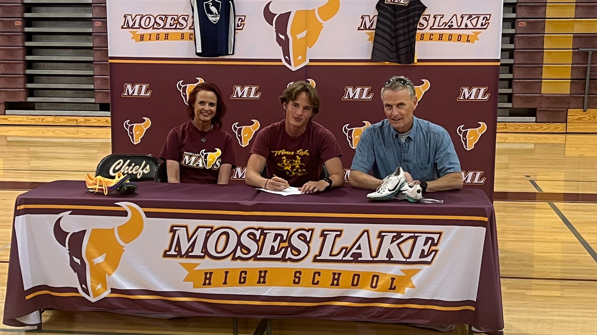 Slide 0 - Oshea signs with Spokane Community College