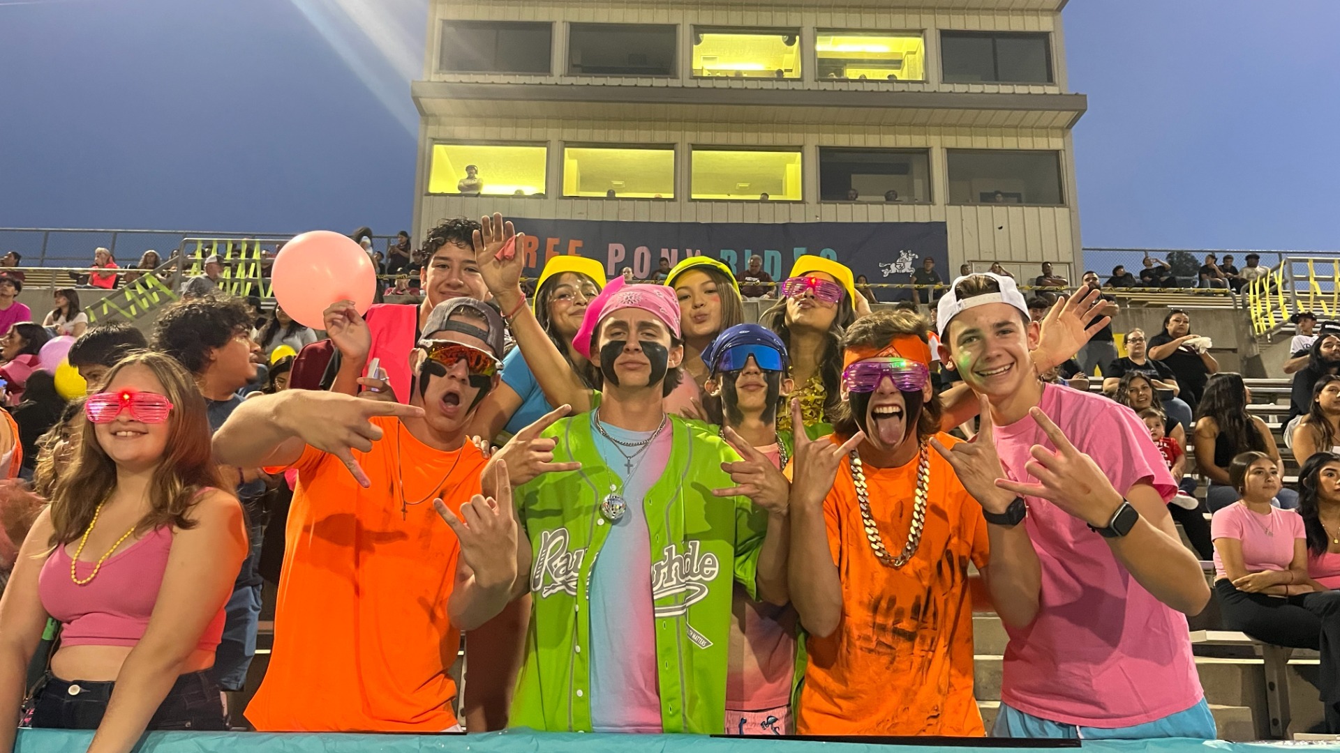 Slide 0 - Pioneer Platoon came out to support football on NEON NIGHT! 