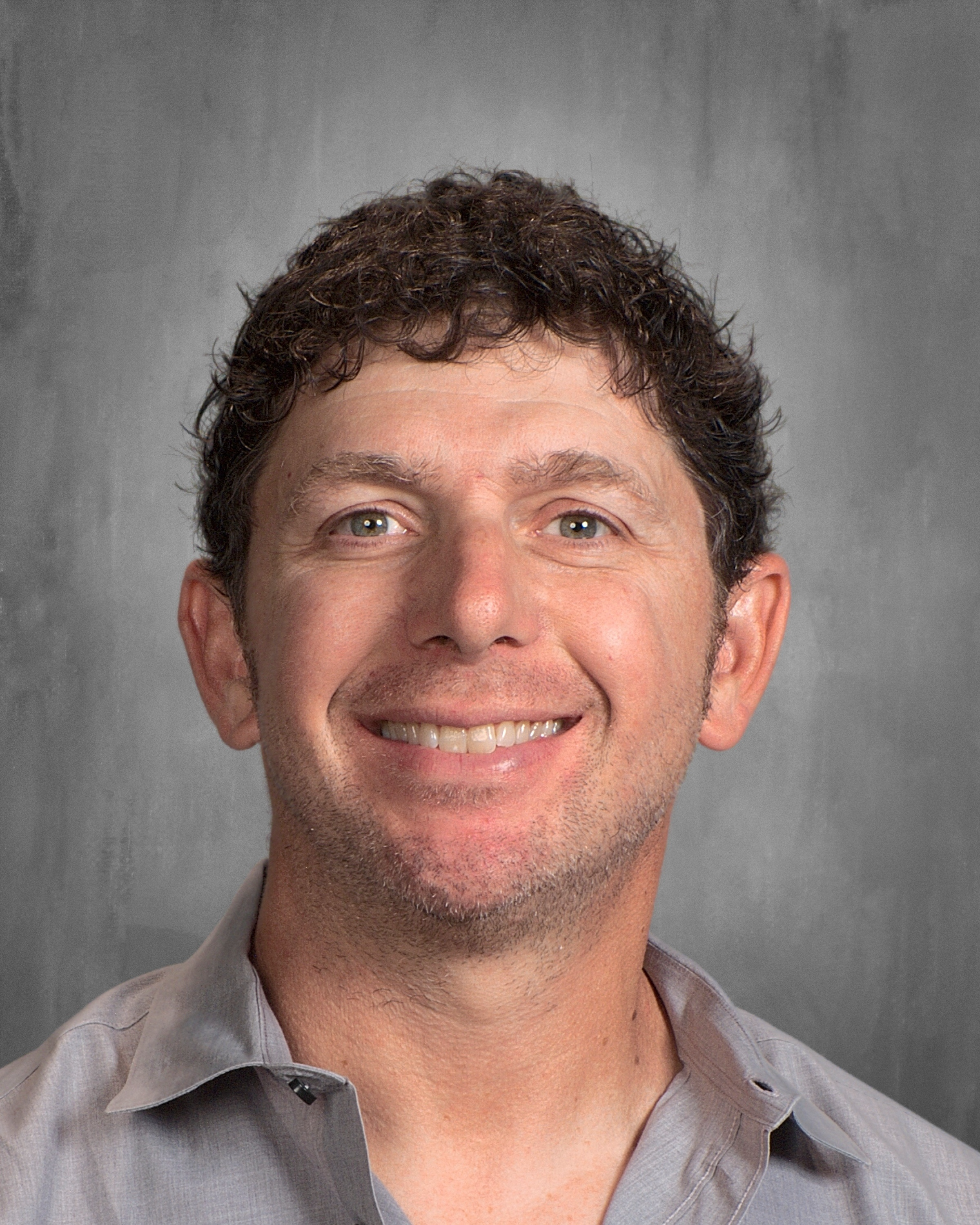 staff photo of Greg Belleau