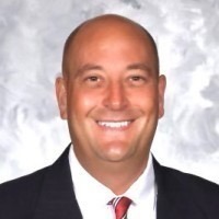 staff photo of Reid Guarnieri