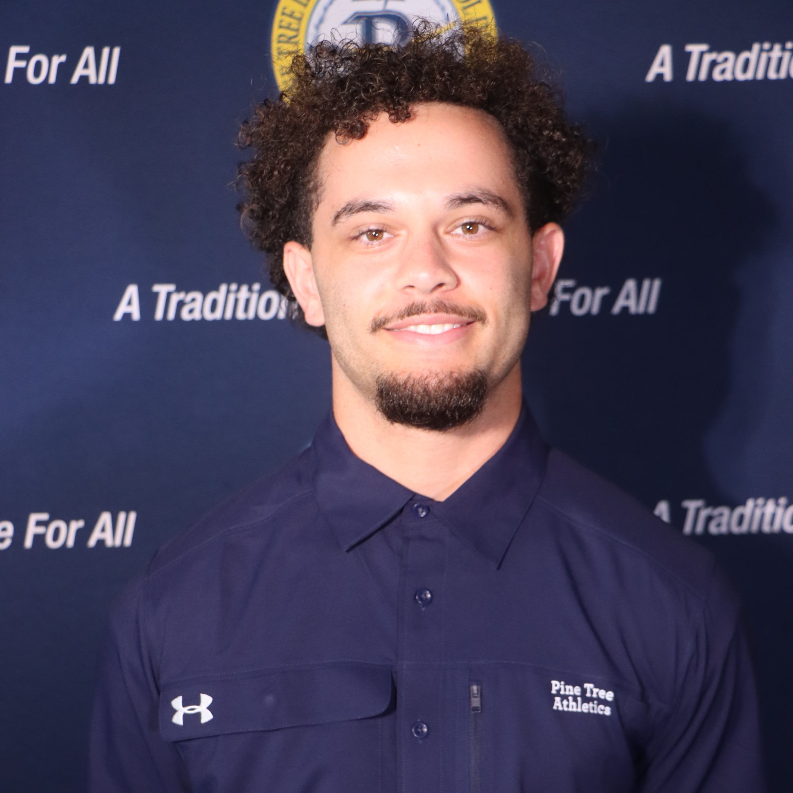 staff photo of DJ Freeman
