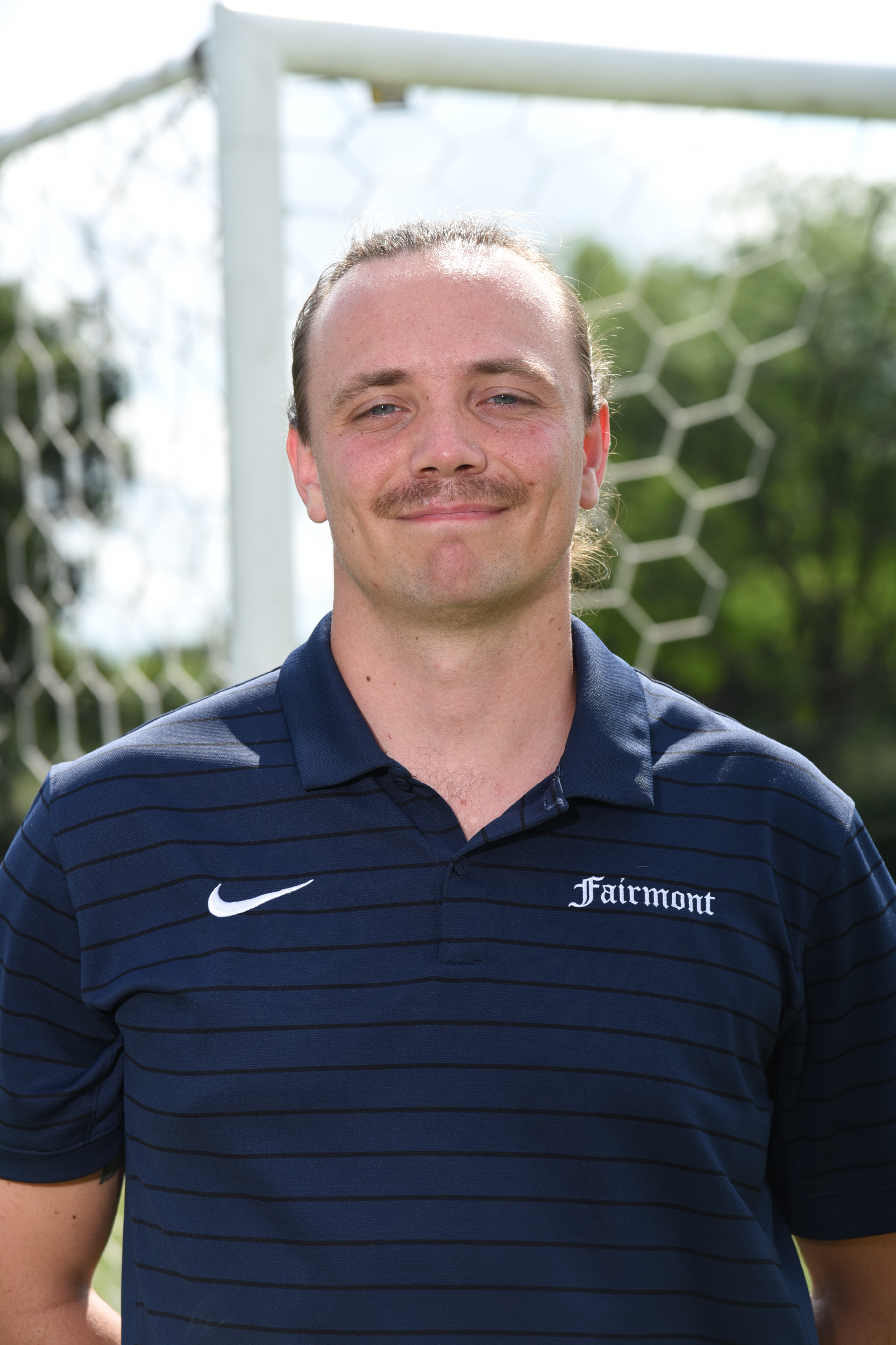staff photo of JR Conerty