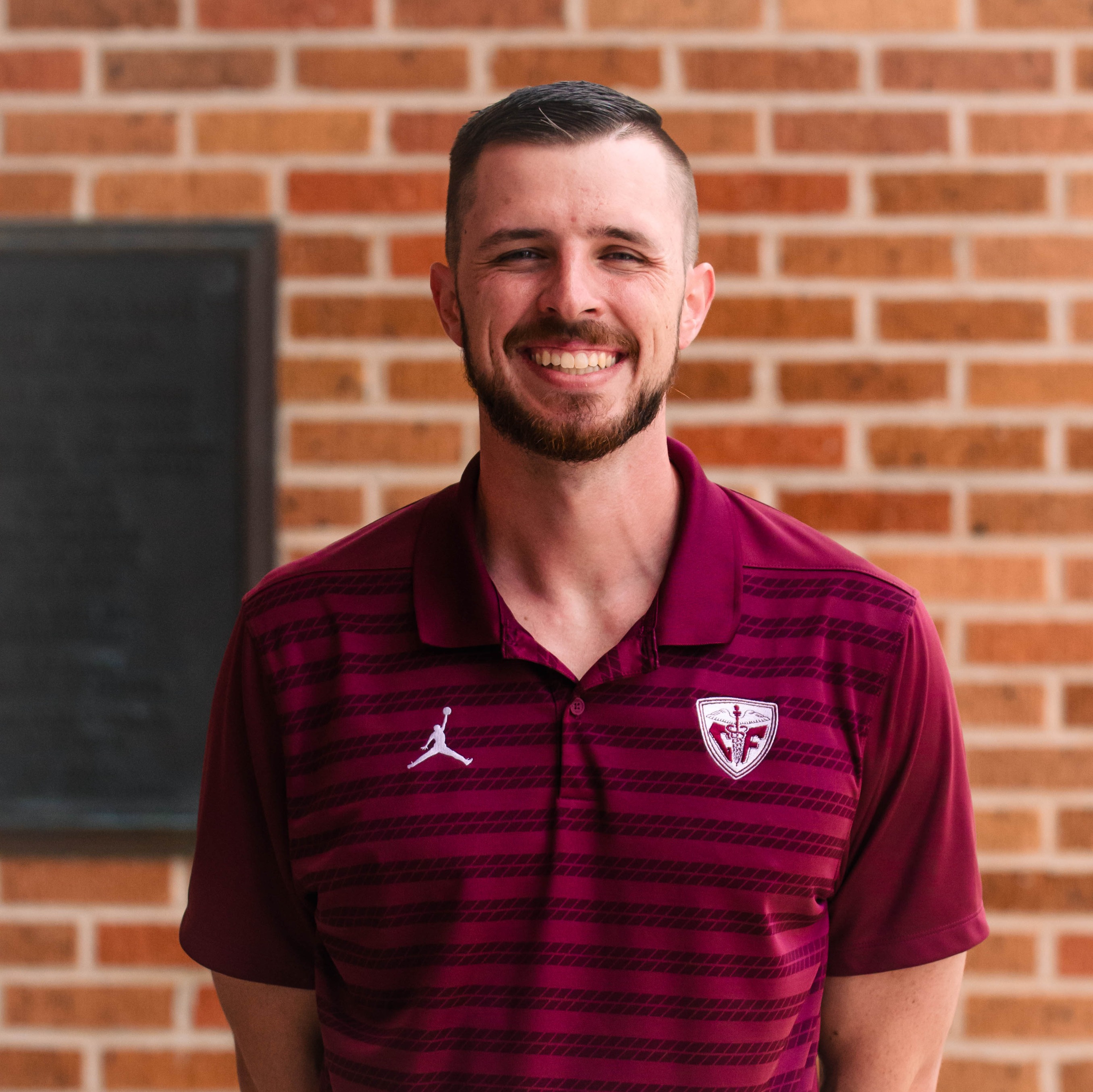 staff photo of Casey Nichols