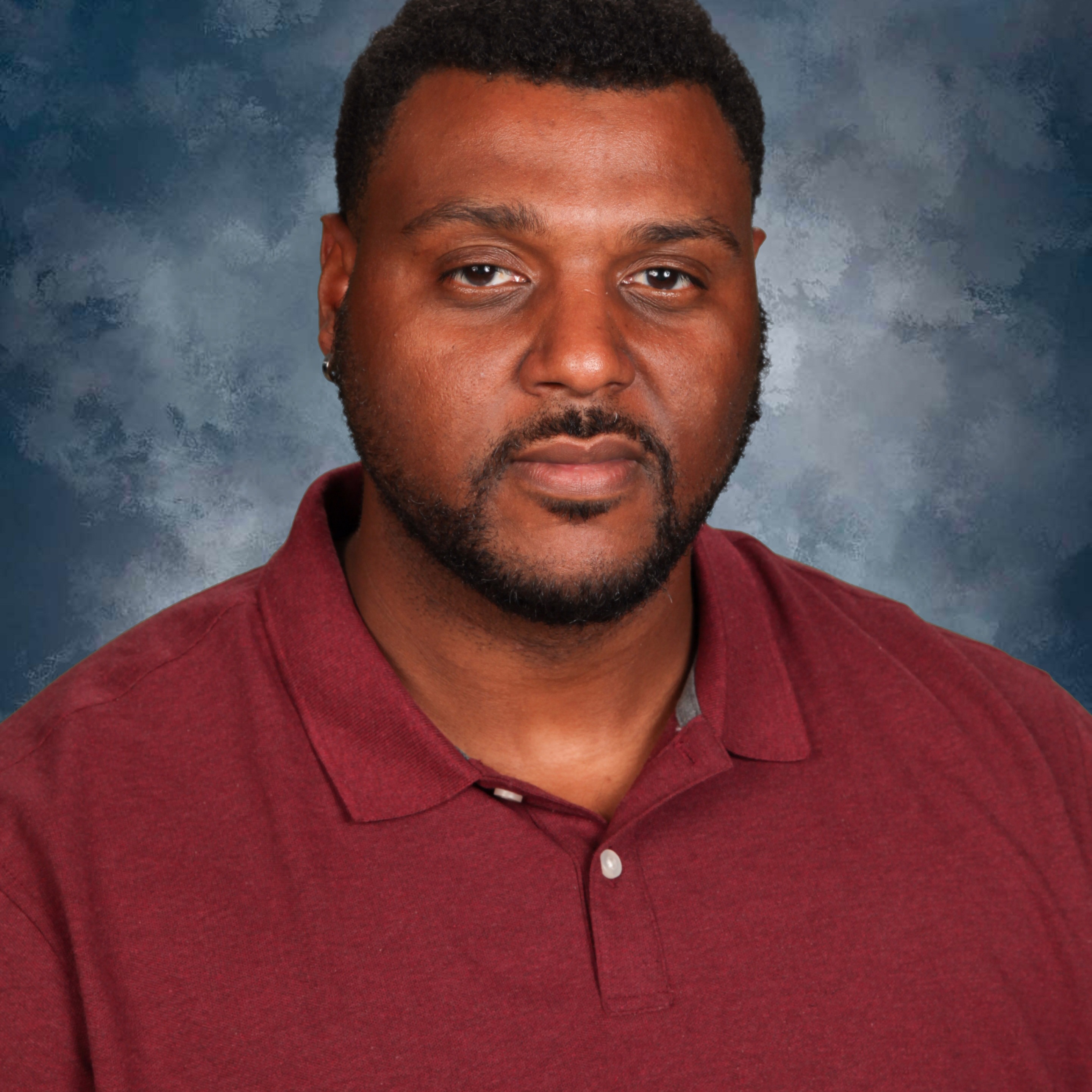 staff photo of Korey Raymond