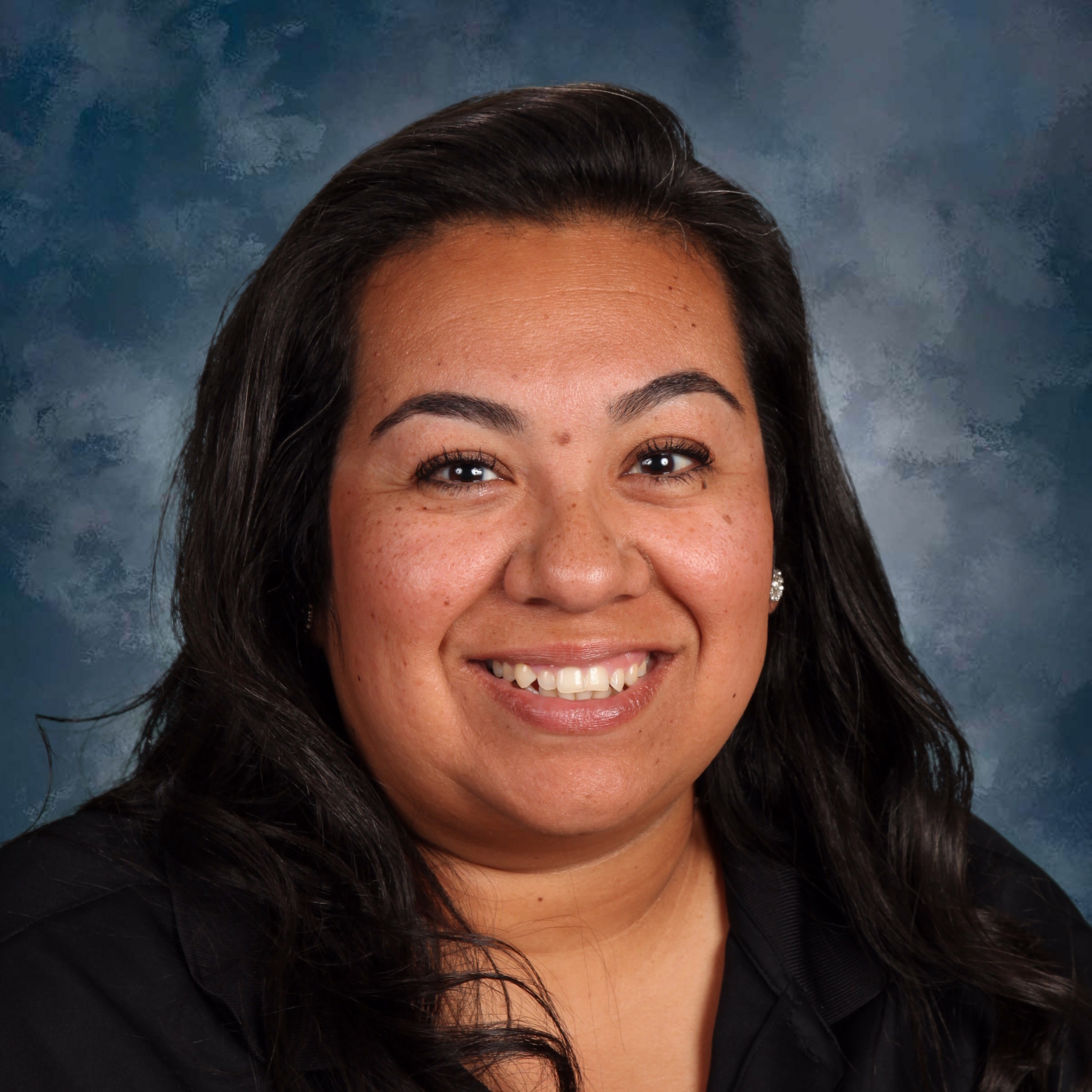 staff photo of Sarah Herrera 
