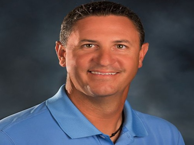 staff photo of Gene  Powell '90