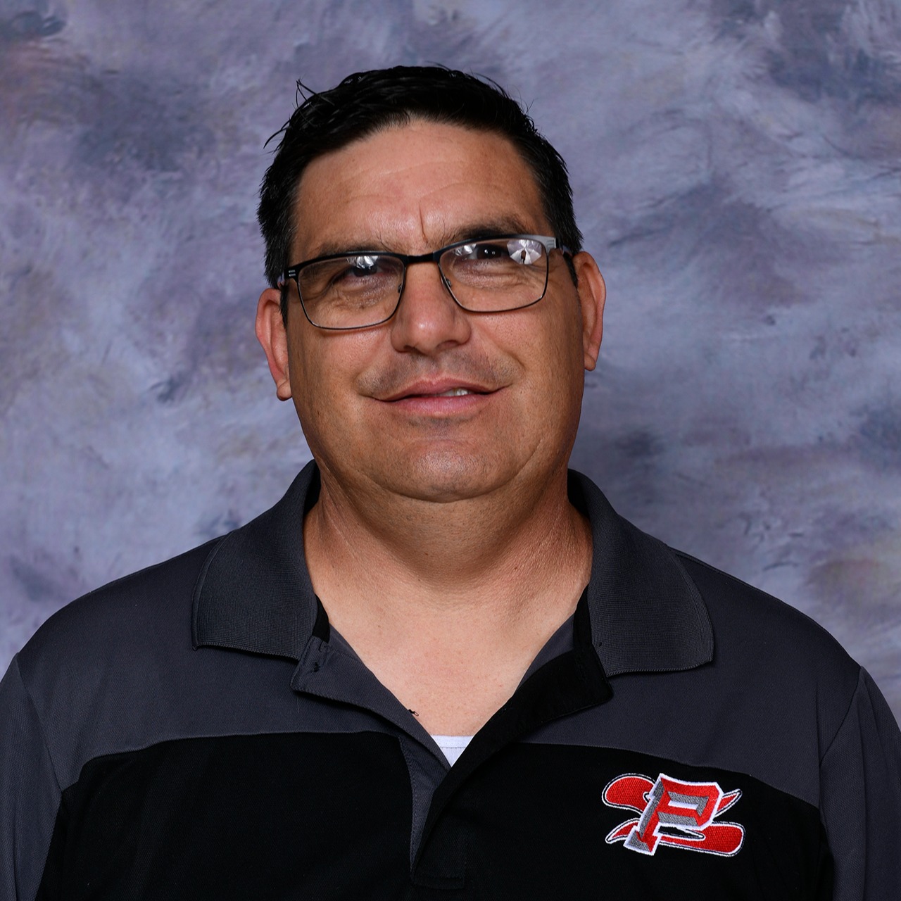 staff photo of Arnold Perez