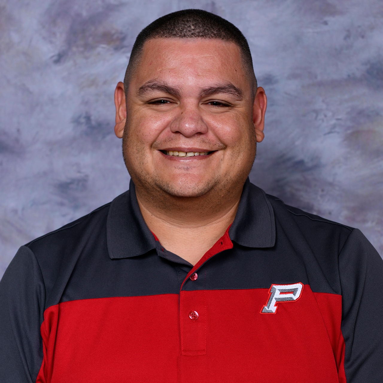 staff photo of Adrian Elizondo