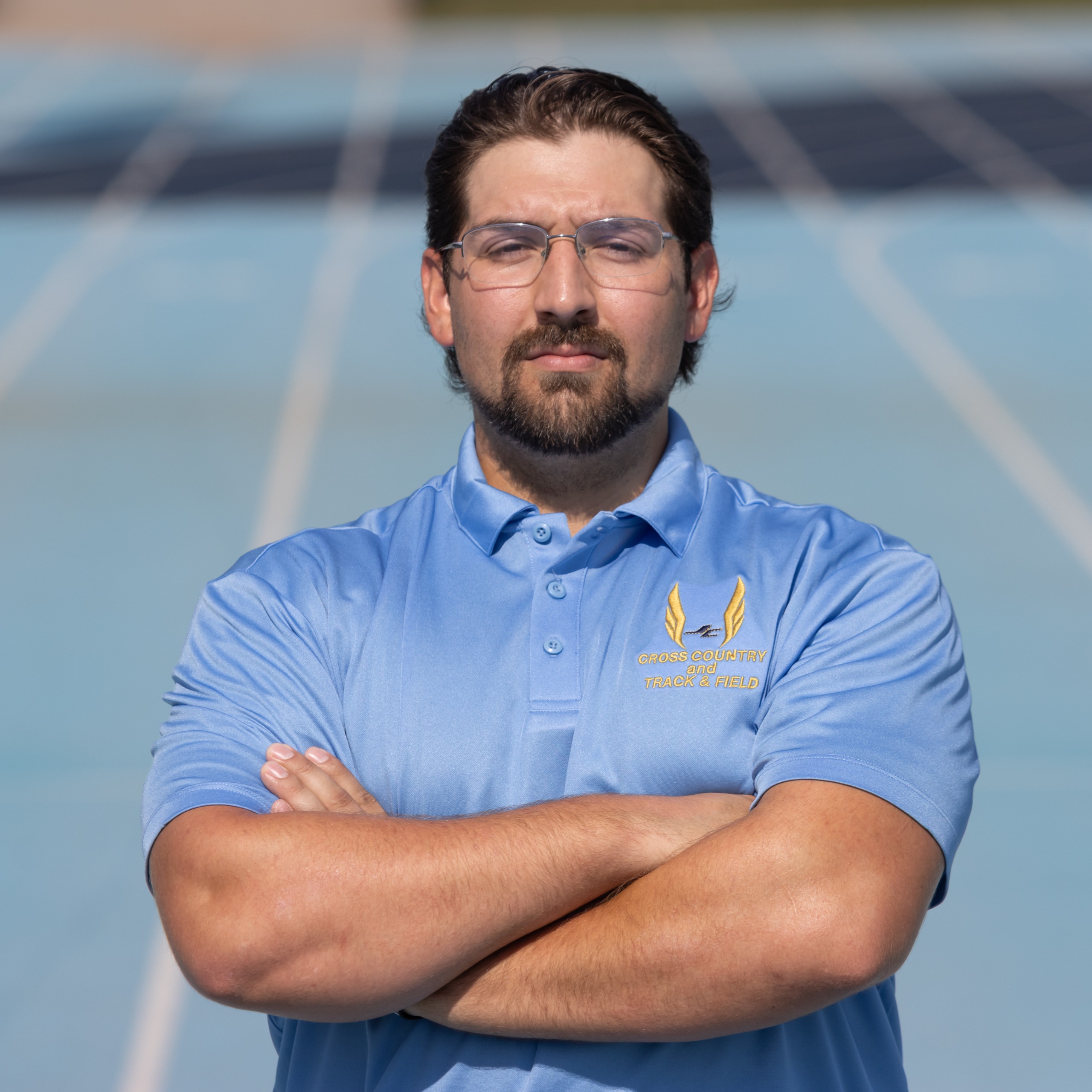 staff photo of Coach Miguel Cortes Jr. 