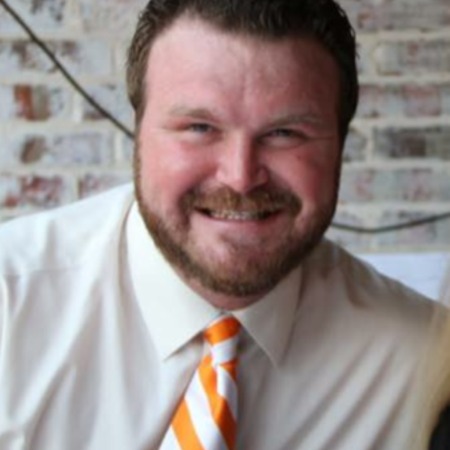 staff photo of Dustin Holly