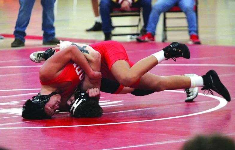 High school wrestling: Flames pinned down by Lincoln News Story Image 